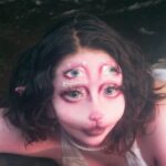 SEO Performance - A woman in a white dress laying in the water