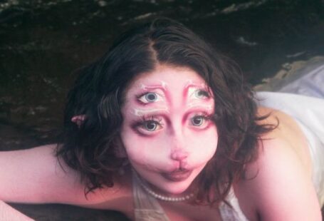 SEO Performance - A woman in a white dress laying in the water