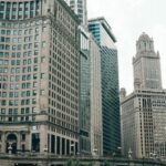 Uptime Guarantee - A Sailing Ferry Boat on the River Near the City Buildings in Chicago Illinois