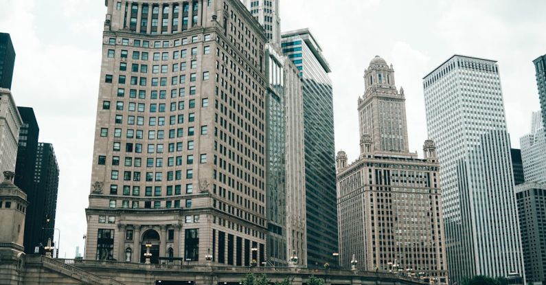 Uptime Guarantee - A Sailing Ferry Boat on the River Near the City Buildings in Chicago Illinois