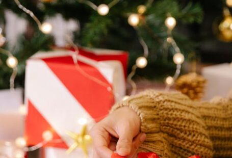 Hosting Package - Woman packaging Christmas present in box