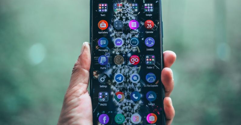 Progressive Web Apps - Crop person holding modern mobile phone