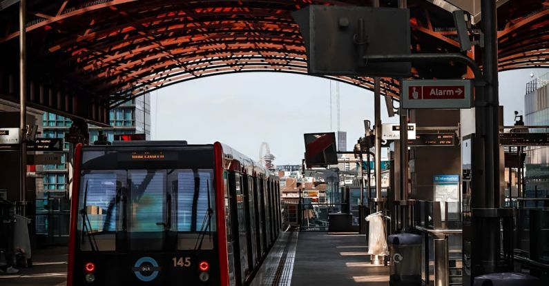 E-commerce Platform - A train is traveling through a station