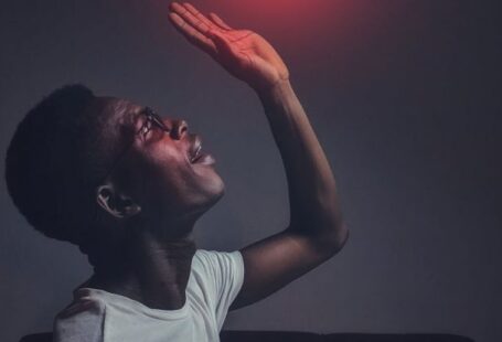 Influencers - Man in White Crew-neck Top Reaching for the Like