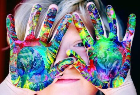 Personalization - A KId With Multicolored Hand Paint