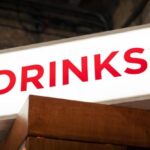 Marketing ROI - A sign that says drinks on it