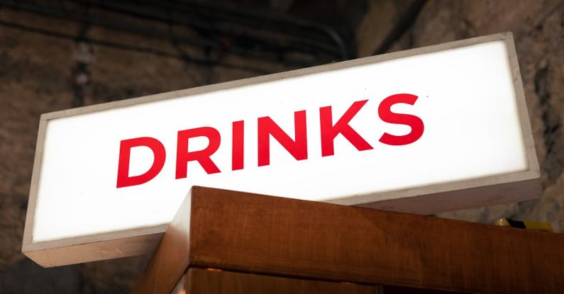 Marketing ROI - A sign that says drinks on it