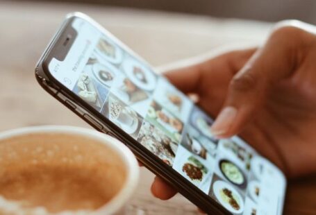 Parallax Scrolling - Selective Focus Photography of Person Using Iphone X