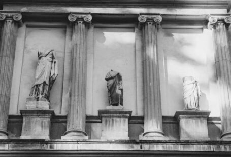 Headless CMS - Grayscale Photo of Headless Statues