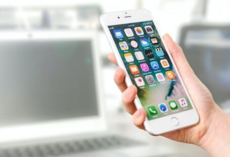 Mobile App - Person Holding Silver Iphone 7