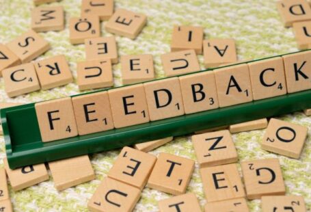Customer Feedback - The word feedback is spelled out with scrabble tiles